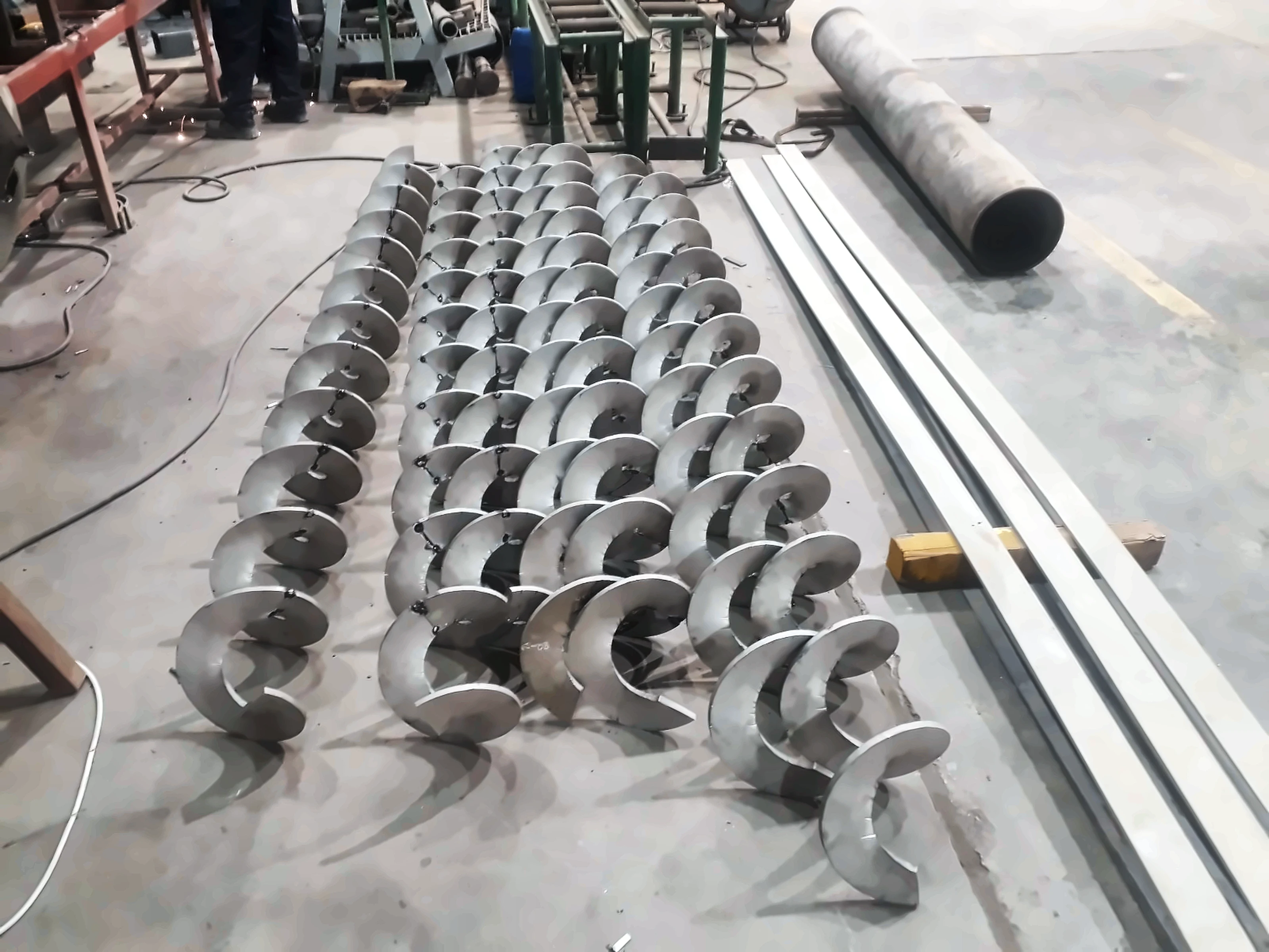 Large-diameter helical auger flight formed in the Auger Bionics UAE workshop